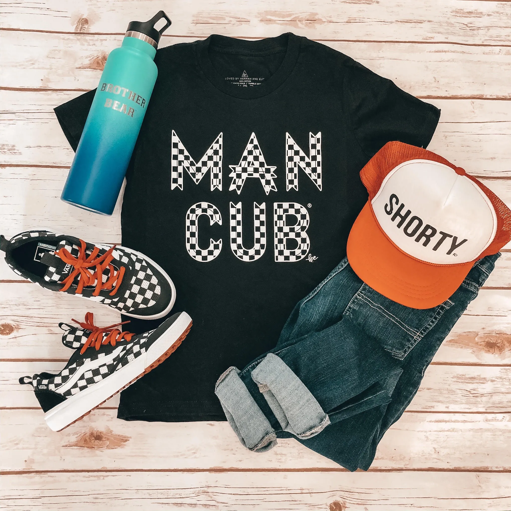 Checkered "Man Cub" Bodysuit and Tees