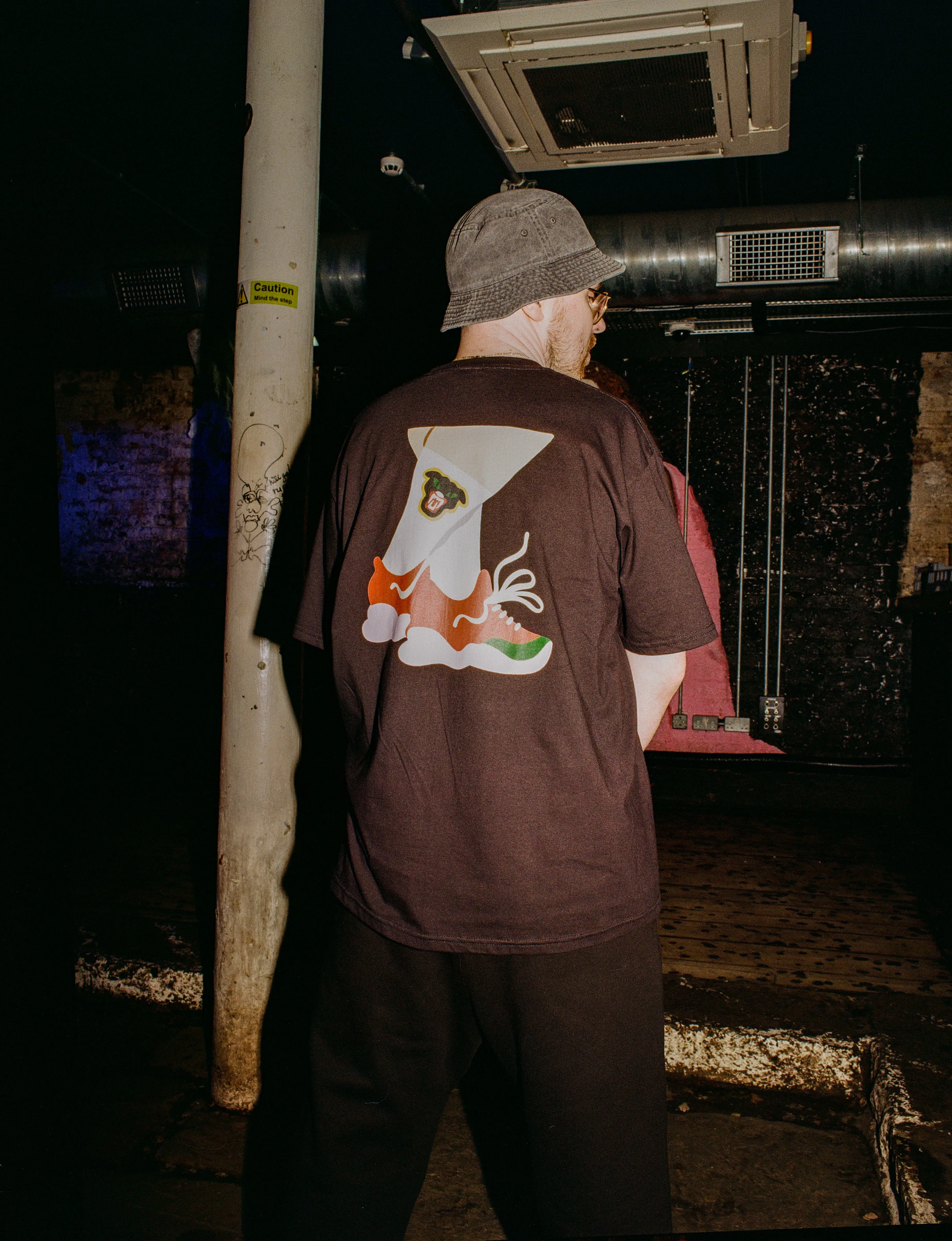 Melé X Club Bad 'Crossed Legs' Tee - Black